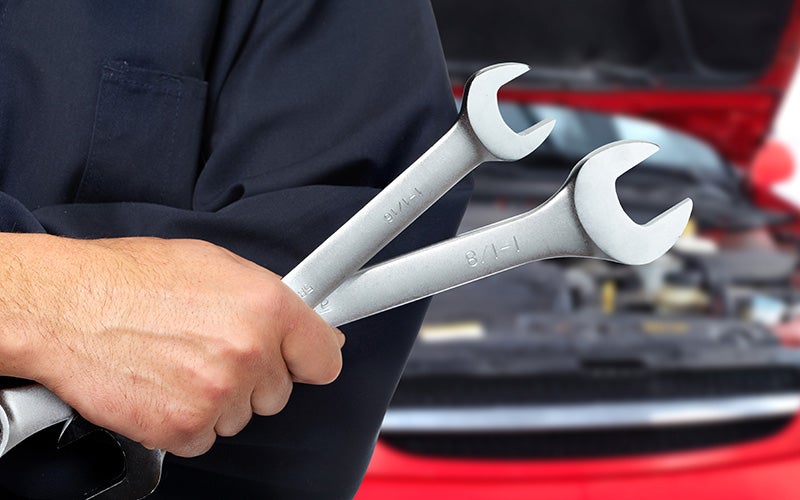 A mecanic holding tools
